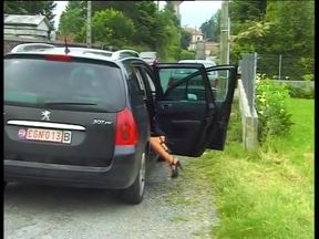 Big boobed MILF fingering her pussy in nature