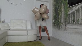 I pop foil balloons in different ways b
