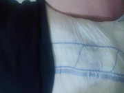 Chubby boy wets his diaper and spanks his padded crotch