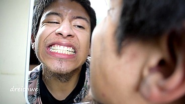 Checking my teeth in the mirror