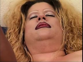Blonde bends over her fat friend and fucks her from behind with vibrator