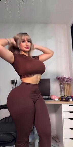 Female Onlyfans Model in Curvy Fitness Outfit