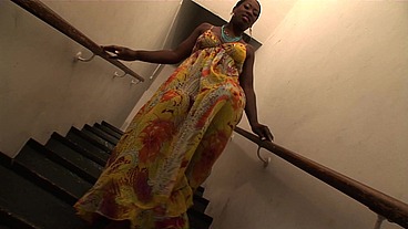 Melvina Raquel is a black British beauty riding in a lift that suddenly stops working