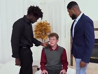 Nerd boy gets pounded and spit-roasted by two black cocks