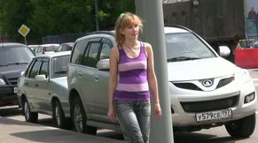 Skanky blonde Russian girl pees right in the middle of the street