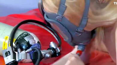 Blonde solo girl explores breathplay with gas mask and oxygen tank