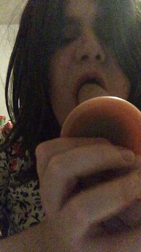 Brunette crossdresser deepthroat dildo