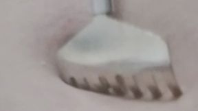 Using a back scratcher to scratch my belly and navel