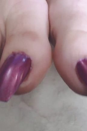 Super long metallic pink toenails