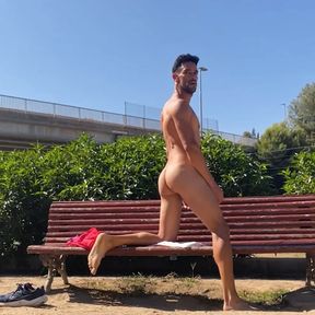 Perfect body man naked on public bench