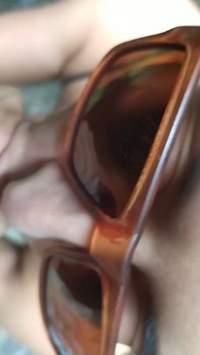 Sexy Latin girl in sunglasses sucking by crowded waterfall   Clip 1