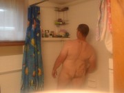 Getting cleaned up in the shower after getting very muddy and dirty