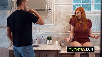 Gorgeous redhead stepmom Lauren Phillips greets her stepson naked and rides on his cock