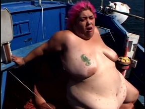 BBW with colored hair gets drilled doggy style on a boat
