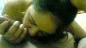 Perverted and happy Indian brunette with big tits is fond of sucking dick