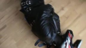 Villein in the leather straitjacket.