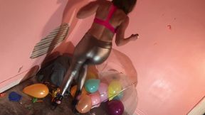 Milf takes big toy and pops balloon while laughing