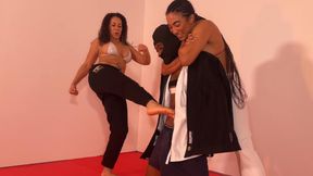 Black Venus and Laken practicing karate kicks and ball busting