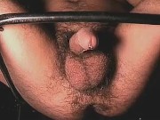 Pissing while sitting in chair.