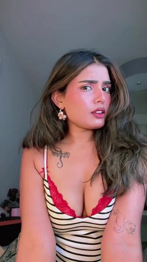Indian woman with big boobs showcases her cleavage