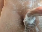 Big white dick stroked in shower