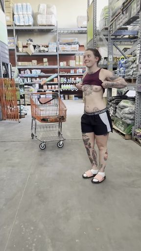 Woman in sports bra and shorts in store