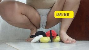 Lola pees on little Teddy