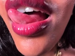 Indian vixen showing off soft wet lips and probing tongue