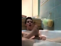 Twink jerking off in bathtub