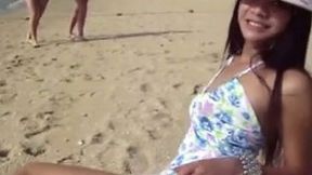 Young and beautiful shemale friend on the beach posing for me