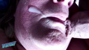 Her mouth gets filled with cum and she swallows