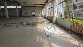 Cute Asian boy masturbates, moaning, ejaculating, and swallowing semen in a sunlit abandoned factory