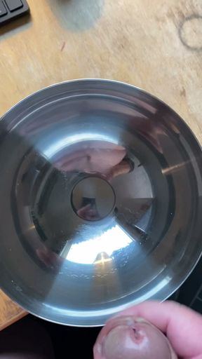 Cumshot in a metal bow