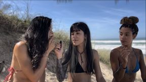 3 Brazilian Goddesses smoking on the beach