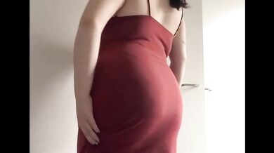 Secretary’s red dress stuffed tight by her feeder