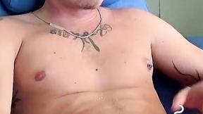 ”Handsome blonde explores his butt while blowing smoke”