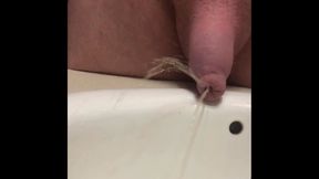 Compilation of pissing through foreskin in the Uncut Lounge