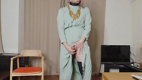 Japanese crossdresser cumshots when excited by genitals touched through long dress