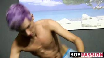 Purple-haired twink masturbates his big cock and moans in solo interview