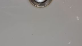 Bathroom Voyeur: Tatted Alpha's Heavy Stream in the Sink