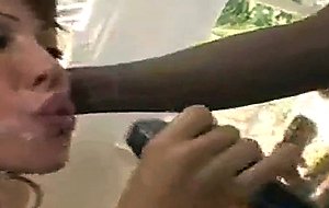 Ava devine deepthroats a huge black cock