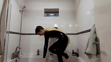 Behind the scenes: getting out of my latex catsuit after a long day of filming. I do love the way my skin looks when It's all...