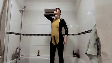 Behind the scenes: getting out of my latex catsuit after a long day of filming. I do love the way my skin looks when It's all...