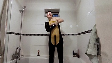 Behind the scenes: getting out of my latex catsuit after a long day of filming. I do love the way my skin looks when It's all...