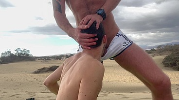 Dom master fucks and uses submissive slut on public beach and pisses inside his ass