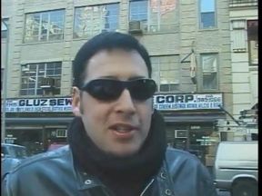 Hot dominatrix in leather with a great body puts a guy in clamps