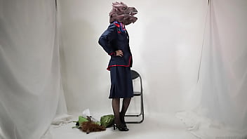 Cabin attendant wearing a monster mask on his head