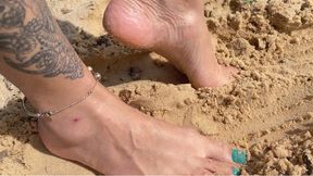 burying your feet in the beach sand