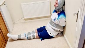 Miss M makes a bound and gagged footballer hop