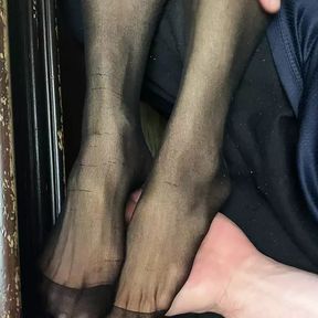 Sexy legs in nylon with tiny feet